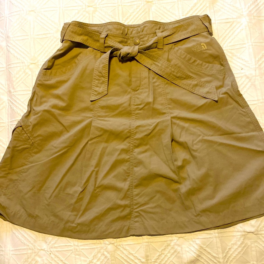 The North Face beige skirt, size 14.  Quick dry, packable, washable. Pockets!